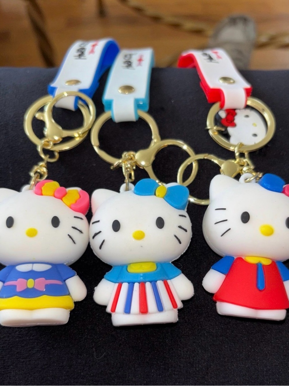 Hello Kitty White & Blue Silicone Keychain Set with Red, Yellow Accents